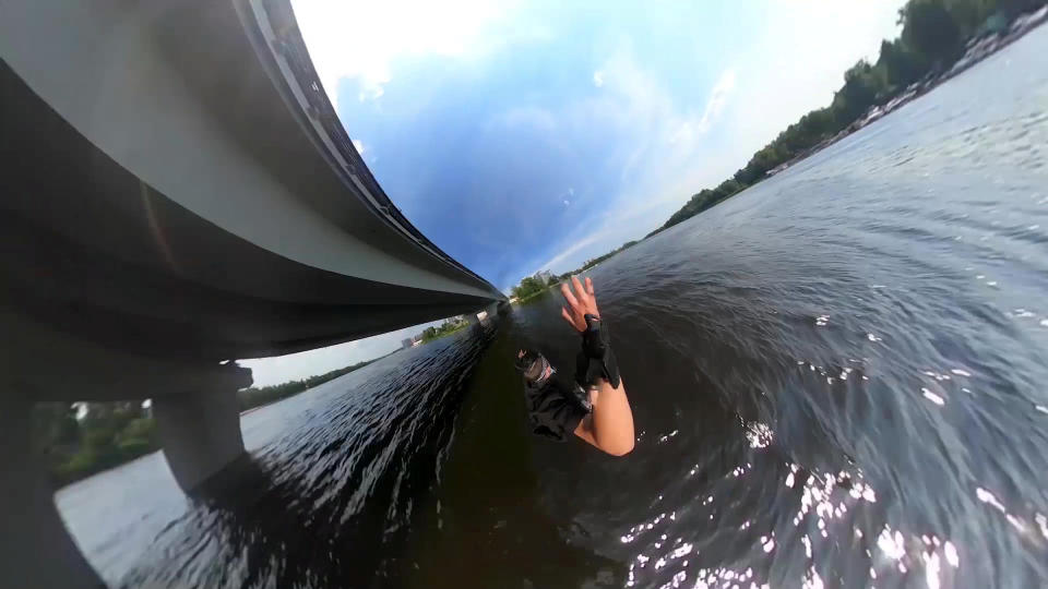 This heart-stopping footage shows a daredevil jumping from a speeding train into a river below. Yaro Panchenko, 18, is seen 'surfing' the subway car as it moves through his home town of Kiev in the Ukraine on August 1 this year. Not content with just surfing the train, Yaro then leaps from the carriage as it crosses a bridge into the water below. However, it didn't go entirely to plan as his Go Pro camera hit him in the face on impact and knocked out a tooth.