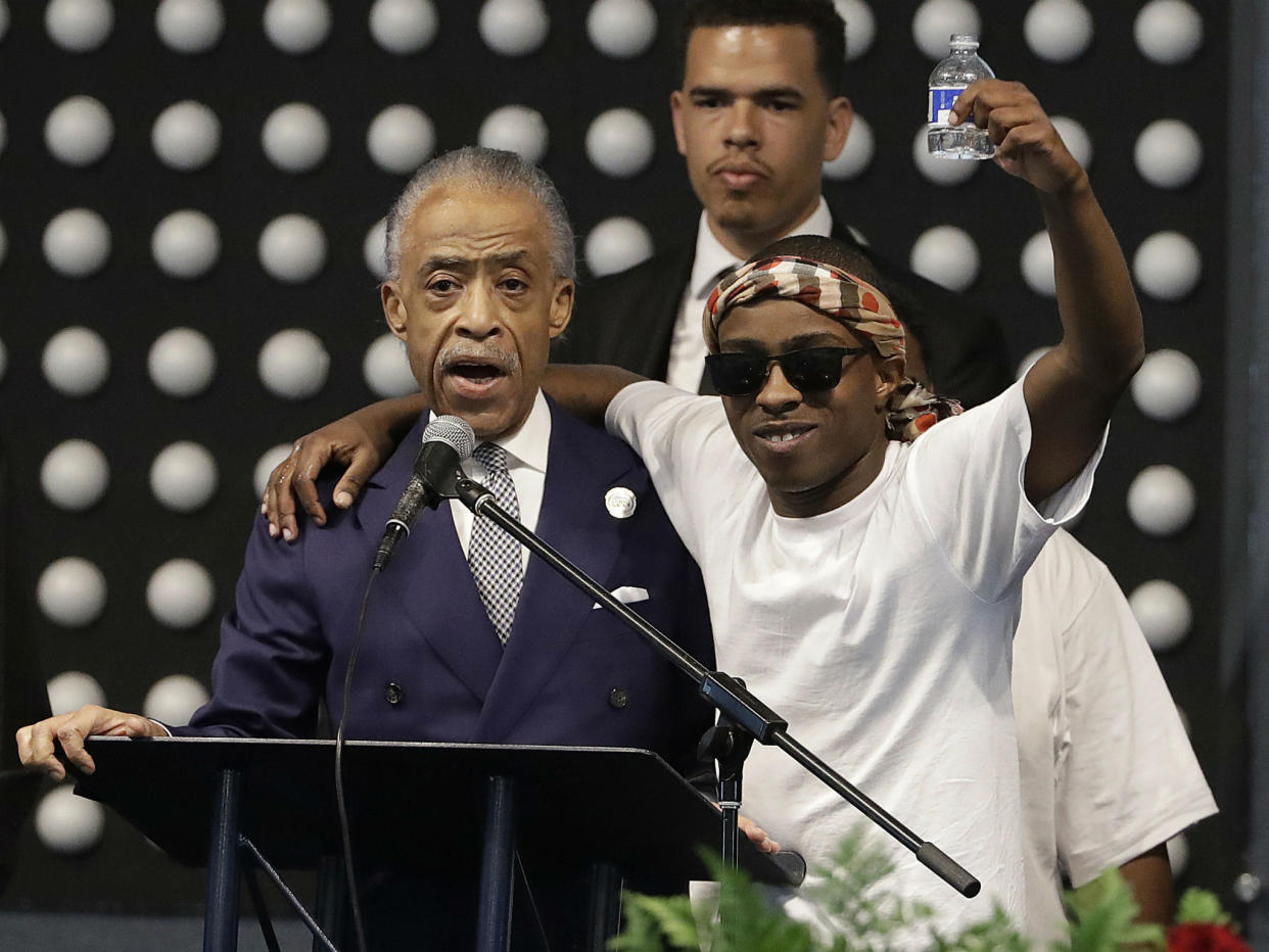 Reverend Al Sharpton with Stevante Clark during the funeral services for Stephon Clark, Stevante's brother, in Sacramento, California: AP Photo/Jeff Chiu