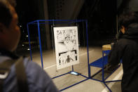 A poster created by artist Naoki Urasawa, one of 20 posters officially selected for the Tokyo Olympics and Paralympics, is on display at the Museum of Contemporary Art Tokyo Monday, Jan. 6, 2020. The official posters are out for this year's Tokyo Olympics and Paralympics. The 20 posters have been created by 19 artists in fields ranging from painting, graphic design, and photography. Calligraphy and Japanese manga are also represented. (AP Photo/Jae C. Hong)