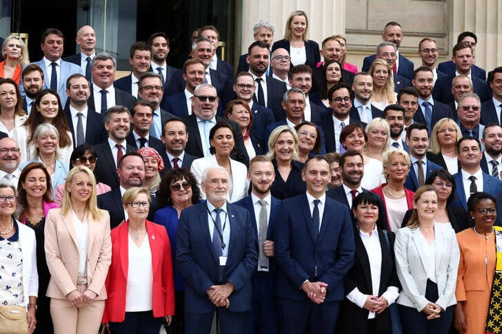 Newly-elected lawmakers make entry to the National Assembly in Paris