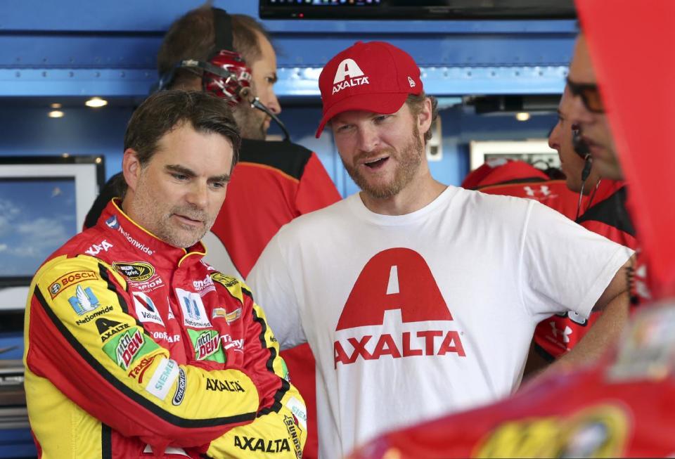 Jeff Gordon and Dale Earnhardt talk strategy prior to a Gordon run in the 88. (Getty Images)