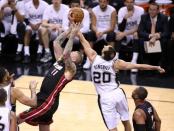 Jun 15, 2014; San Antonio, TX, USA; San Antonio Spurs guard Manu Ginobili (20) fights for a loose ball against Miami Heat center Chris Andersen (11) in game five of the 2014 NBA Finals at AT&T Center. Soobum Im-USA TODAY Sports