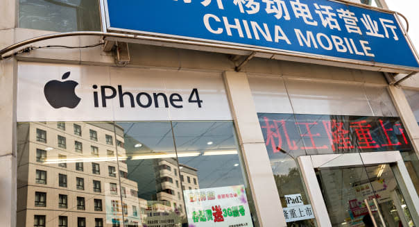 Sign in Chinese advertising the Apple iPhone and iPad at a China Mobile store in Beijing, China