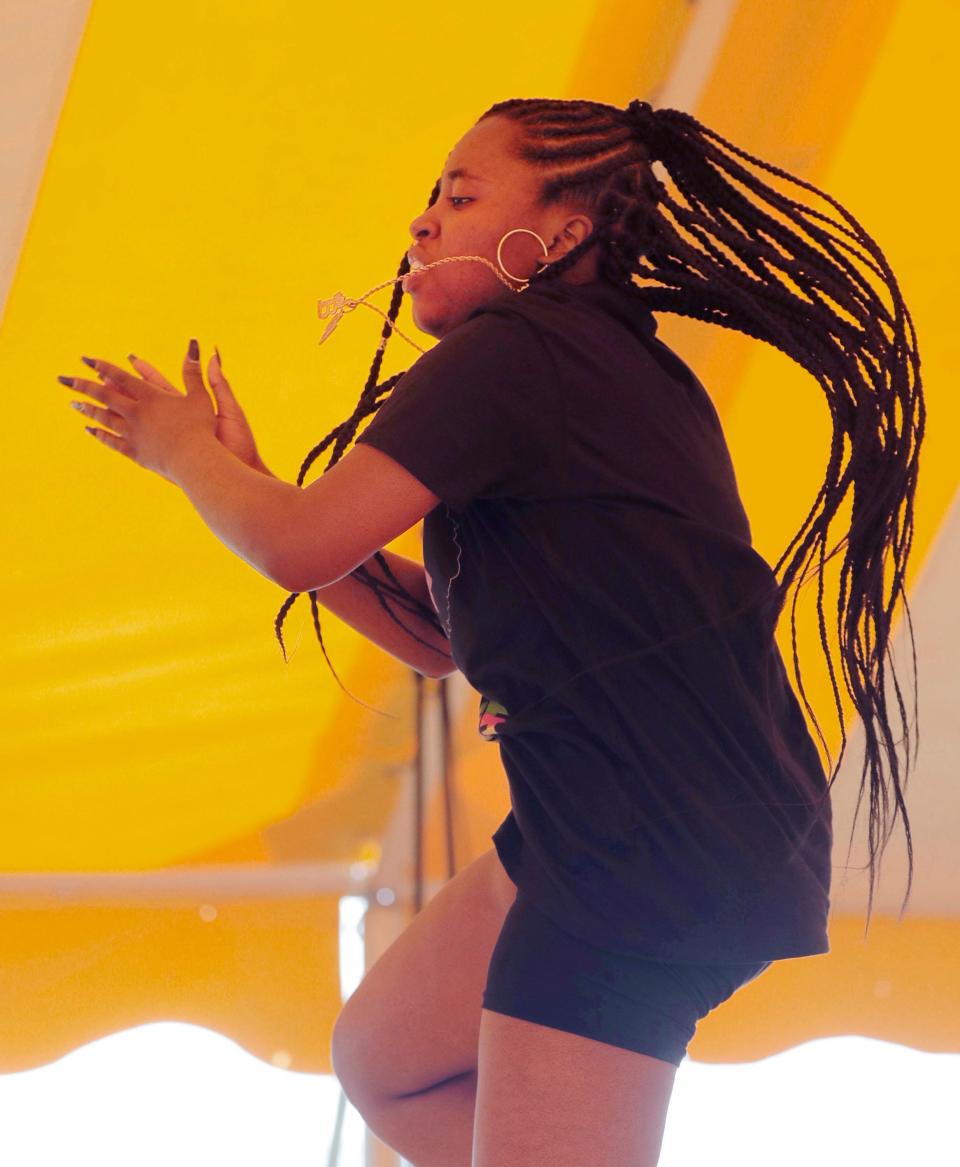 Bri Crump performs a hip hop dance during the second annual Black American Community Outreach Juneteenth celebration, Sunday, June 19, 2022, in Sheboygan, Wis.