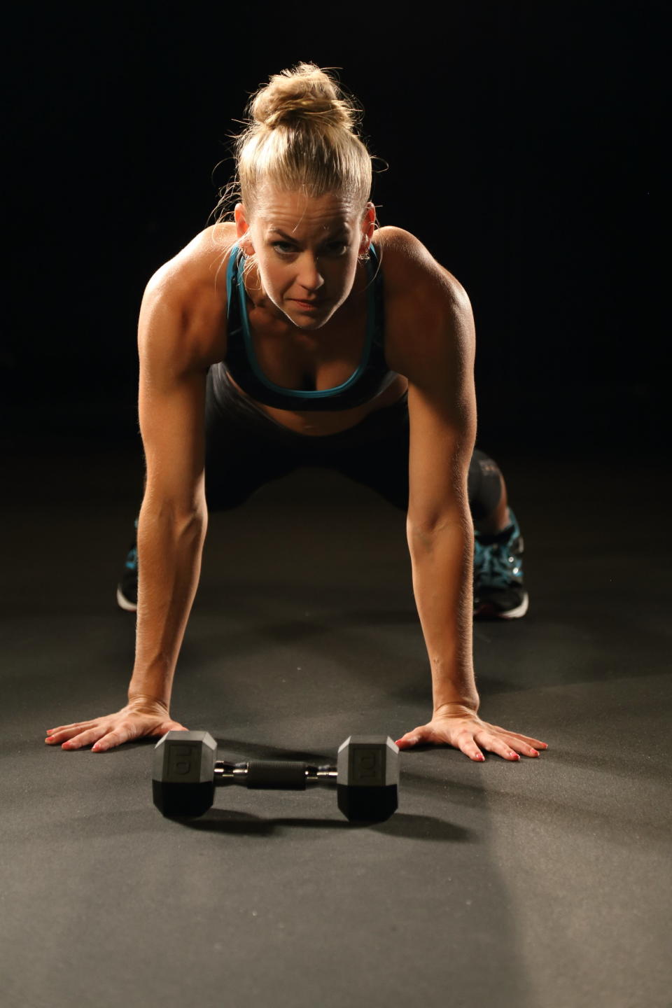 Squat until hands touch the ground in front of you then hop both feet back to a plank position. Lower down until chest touches the floor and push up into a plank. Hop feet back in by your hands and stand up, jumping as high as you can.