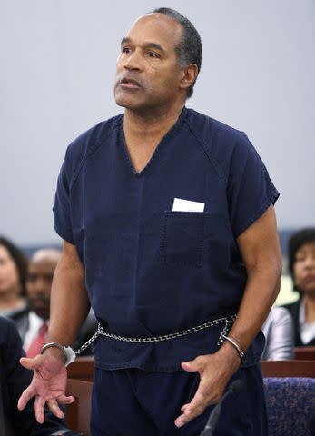 <p>Issac Brekken-Pool/Getty</p> O.J. Simpson speaks in court prior to his sentencing at the Clark County Regional Justice Center on December 5, 2008.