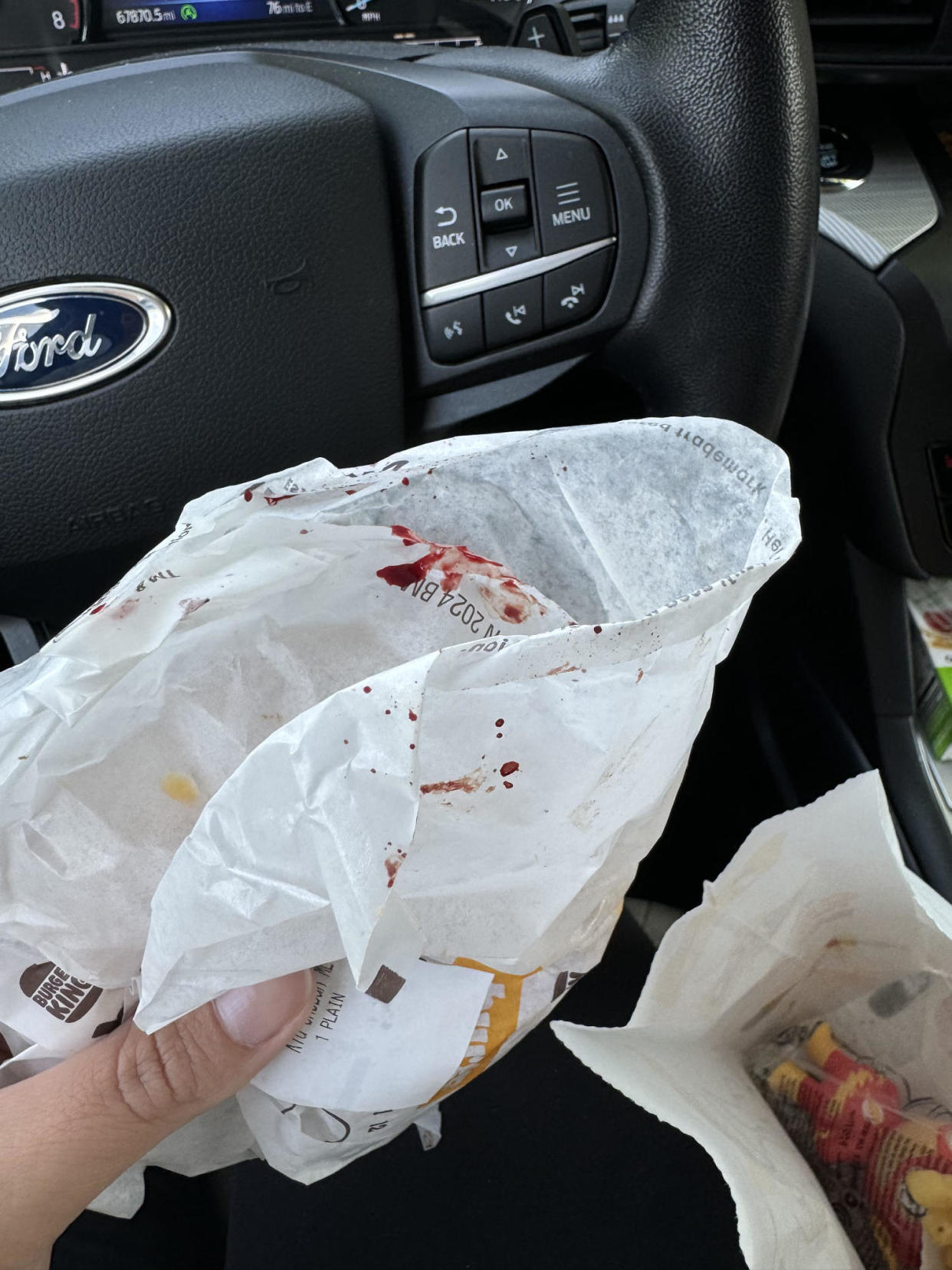 Burger with blood on wrapper (Courtesy Tiffany Floyd)