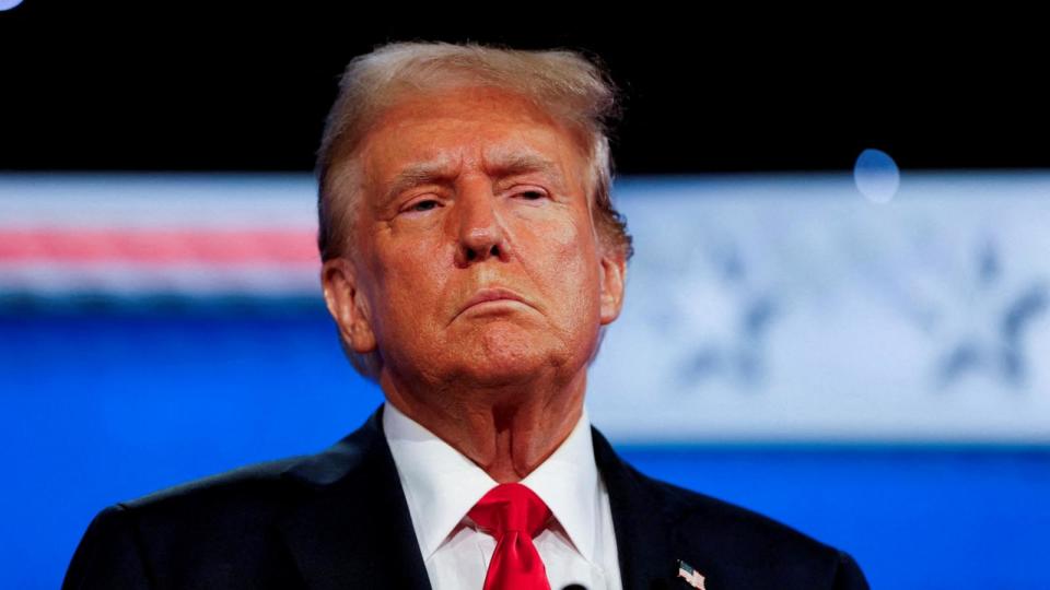 PHOTO: Republican presidential candidate and former President Donald Trump attends the first presidential debate in Atlanta, Georgia, June 27, 2024.  (Marco Bello/Reuters)