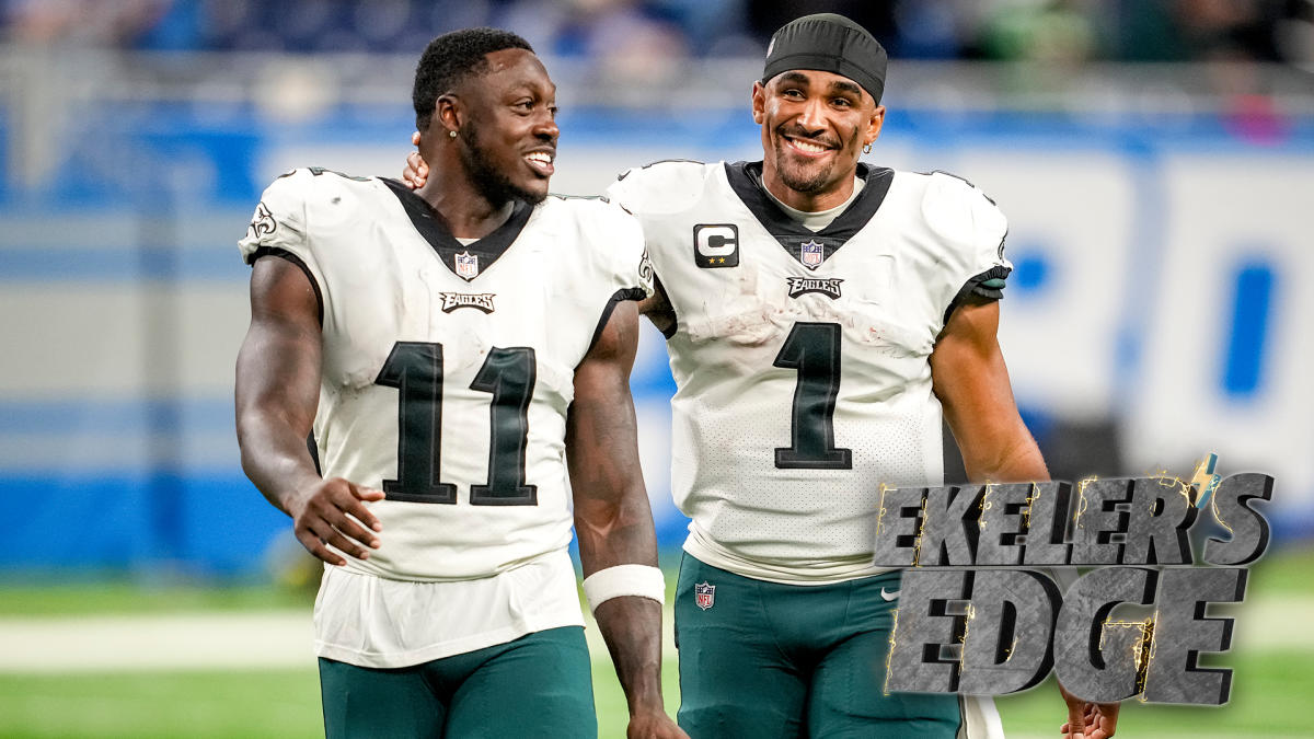 Philadelphia Eagles wide receiver A.J. Brown (11) and quarterback Jalen  Hurts (1) talk after an NFL