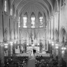 <p>A 1950s wedding takes place at the alter of New York's landmark cathedral, Saint Patrick's. The Catholic church is still in use today, <a href="https://saintpatrickscathedral.org/masses" rel="nofollow noopener" target="_blank" data-ylk="slk:offering mass every Sunday;elm:context_link;itc:0;sec:content-canvas" class="link ">offering mass every Sunday</a>. </p>