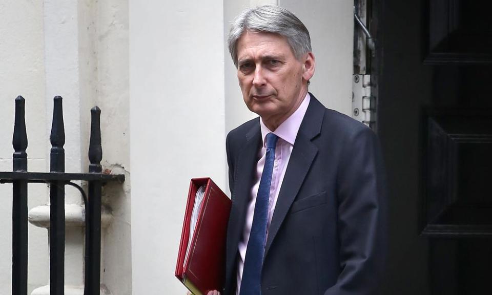 Chancellor Philip Hammond leaving 11 Downing Street in London.