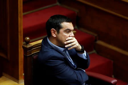 Greek PM Alexis Tsipras attends a parliamentary session before a vote on German World War II reparations in Athens, Greece April 17, 2019. REUTERS/Costas Baltas