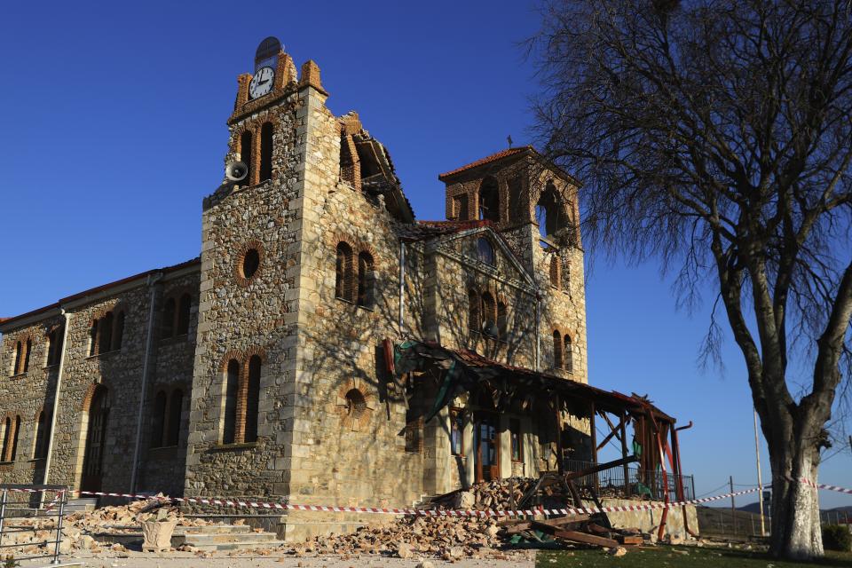 Damage is seen on a church after an earthquake in Mesochori village, central Greece, Wednesday, March 3, 2021. An earthquake with a preliminary magnitude of at least 6.0 struck central Greece Wednesday and was also felt in neighboring Albania and North Macedonia, and as far as Kosovo and Montenegro. (AP Photo/Vaggelis Kousioras)