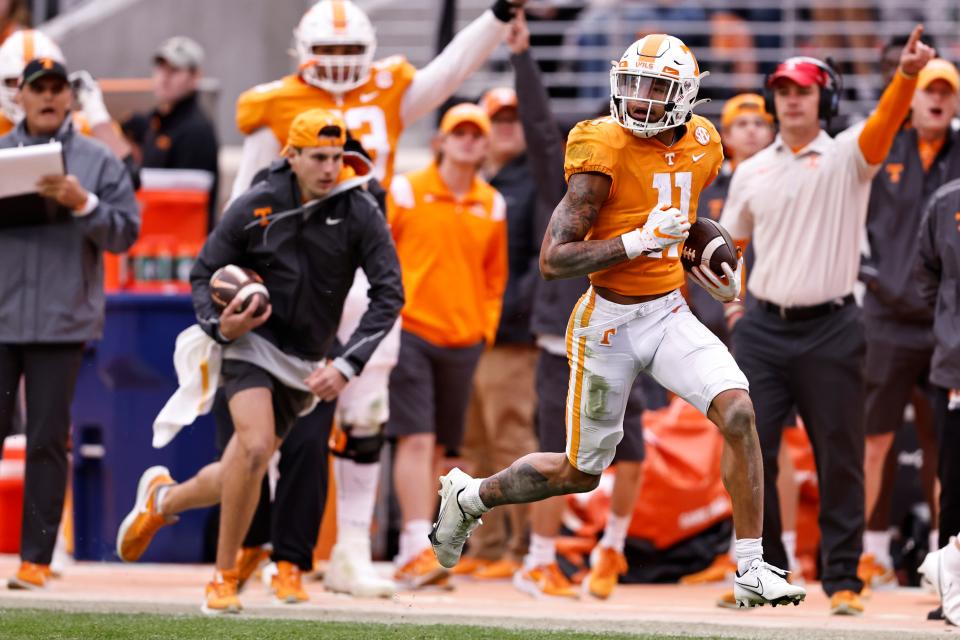 Tennessee wide receiver Jalin Hyatt (11) runs for a touchdown during the second half of an NCAA college football game against Missouri Saturday, Nov. 12, 2022, in Knoxville, Tenn. (AP Photo/Wade Payne)