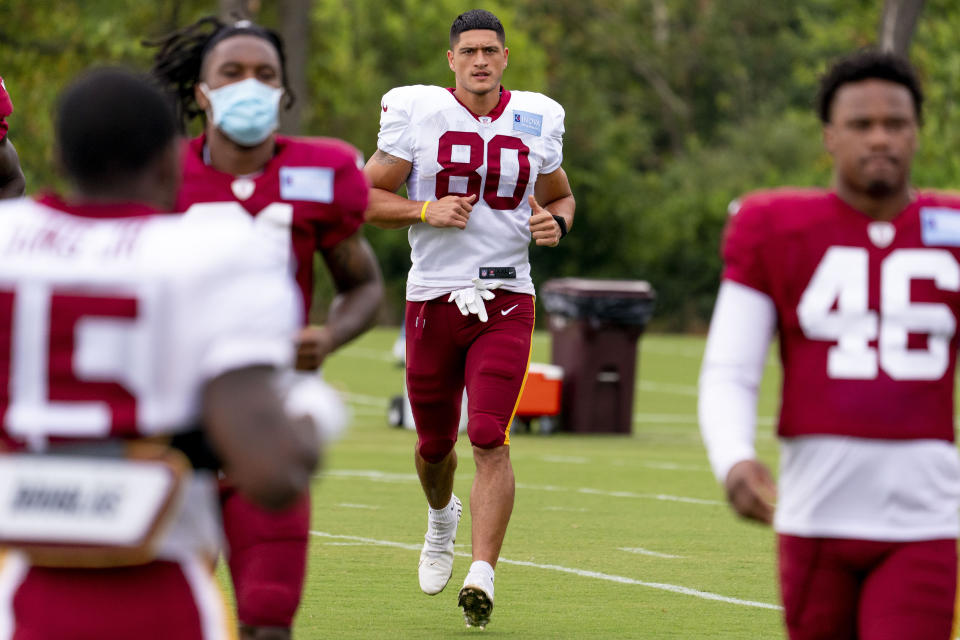 Washington Football Team tight end Sammis Reyes (80) participates in the team's NFL football training camp practice in Ashburn, Va., Tuesday, Aug. 3, 2021. (AP Photo/Andrew Harnik)