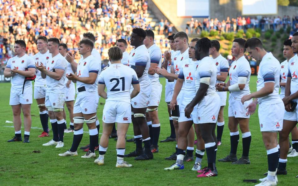 England's player react after losing the U20 World Rugby Union Championship final against France - AFP