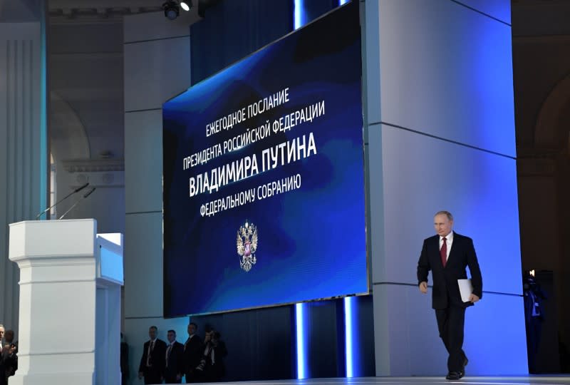 Russian President Putin arrives to deliver his address to the Federal Assembly in Moscow