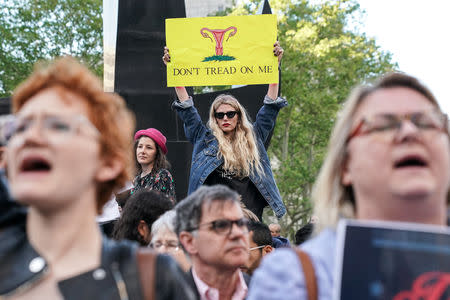 Abortion-rights campaigners attend a rally against new restrictions on abortion passed by legislatures in eight states including Alabama and Georgia, in New York City, U.S., May 21, 2019. REUTERS/Jeenah Moon