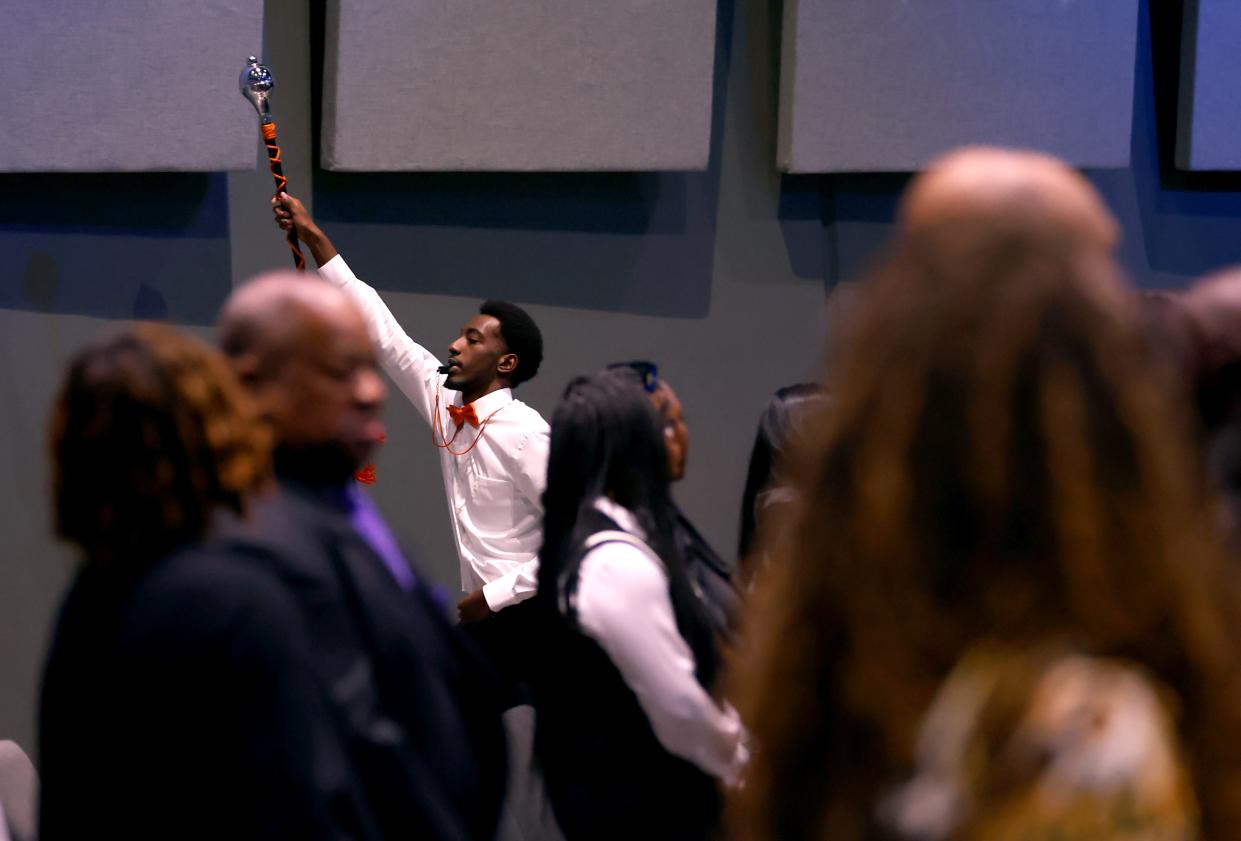 The Douglass High School marching band plays during a remembrance ceremony for Dr. Kenneth Wayne Blair, Sr., known as Santa Blair, at Life Church in Edmond, Okla. Saturday, April 6, 2024.