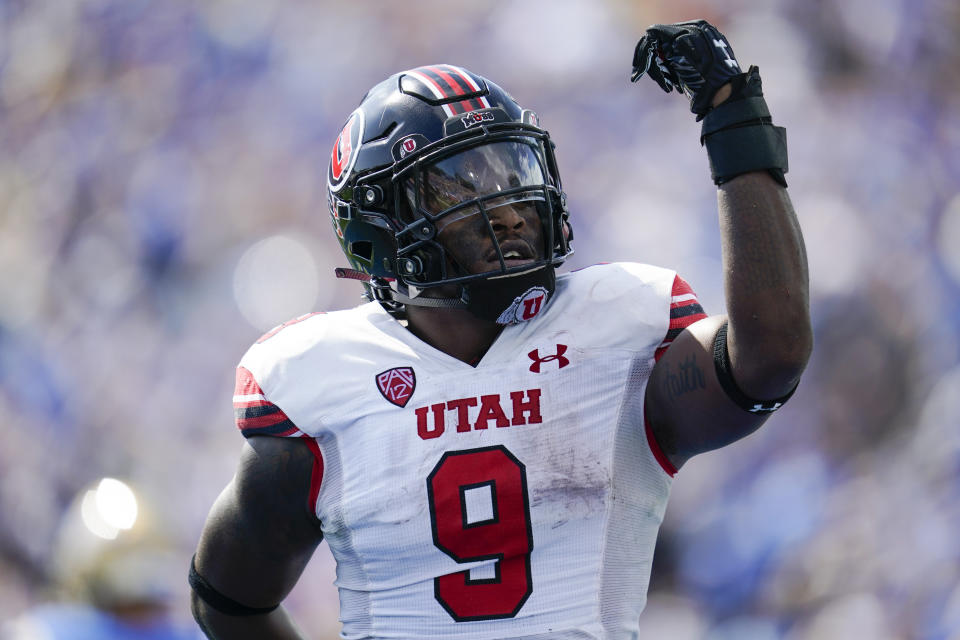 Utah running back Tavion Thomas (9) celebrates after scoring a touchdown during the first half of an NCAA college football game against UCLA in Pasadena, Calif., Saturday, Oct. 8, 2022. (AP Photo/Ashley Landis)