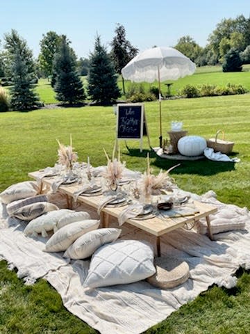 Lake Country Picnic Co. rentals include tables, pillows, umbrellas, china and other décor for a luxurious experience.