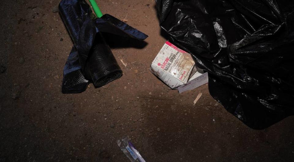 A used package of Narcan lies on the ground in East St. Louis on Aug. 22. Narcan is a brand of naxolone, a medication designed to rapidly reverse overdose of fentanyl, heroin and other opioids.