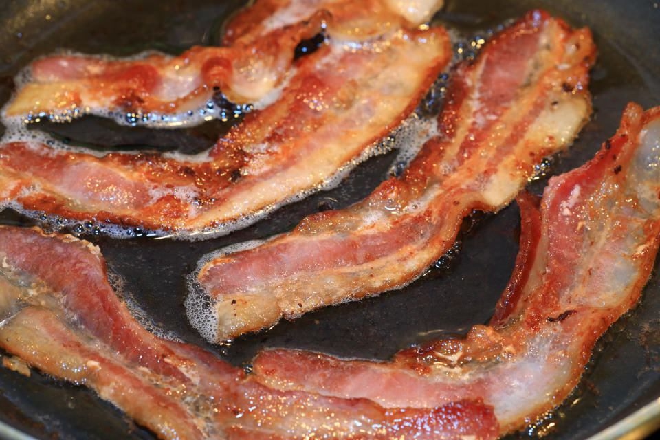 <div><p>"I hated cooking bacon. It's not that it's difficult — it's just such a popular food item that it was all I would end up cooking. First thing in the morning, even before mise en place, start cooking bacon. Try and get three batches done before the buffet opened in order to give ourselves some cushion. Once service started, it was nothing but bacon, bacon, bacon. Lay out dozens of pieces of bacon on a several sheet pans. Stick in the oven and bake for 18 minutes. Send out to the buffet. Immediately start another batch because the bacon would be emptied out in minutes. Repeat ad nauseum for four hours. Literally, one person would just handle bacon while the rest would be able replenish all the other food items. Go home covered in bacon grease. Take a shower, and the bacon smell gets aerosolized. It's been almost three years since I worked there, and I still can't stand the sight, smell, or taste of bacon."</p><p>—<a href="https://www.reddit.com/user/randamuspdx/" rel="nofollow noopener" target="_blank" data-ylk="slk:u/randamuspdx;elm:context_link;itc:0;sec:content-canvas" class="link ">u/randamuspdx</a></p></div><span> Douglas Sacha / Getty Images</span>