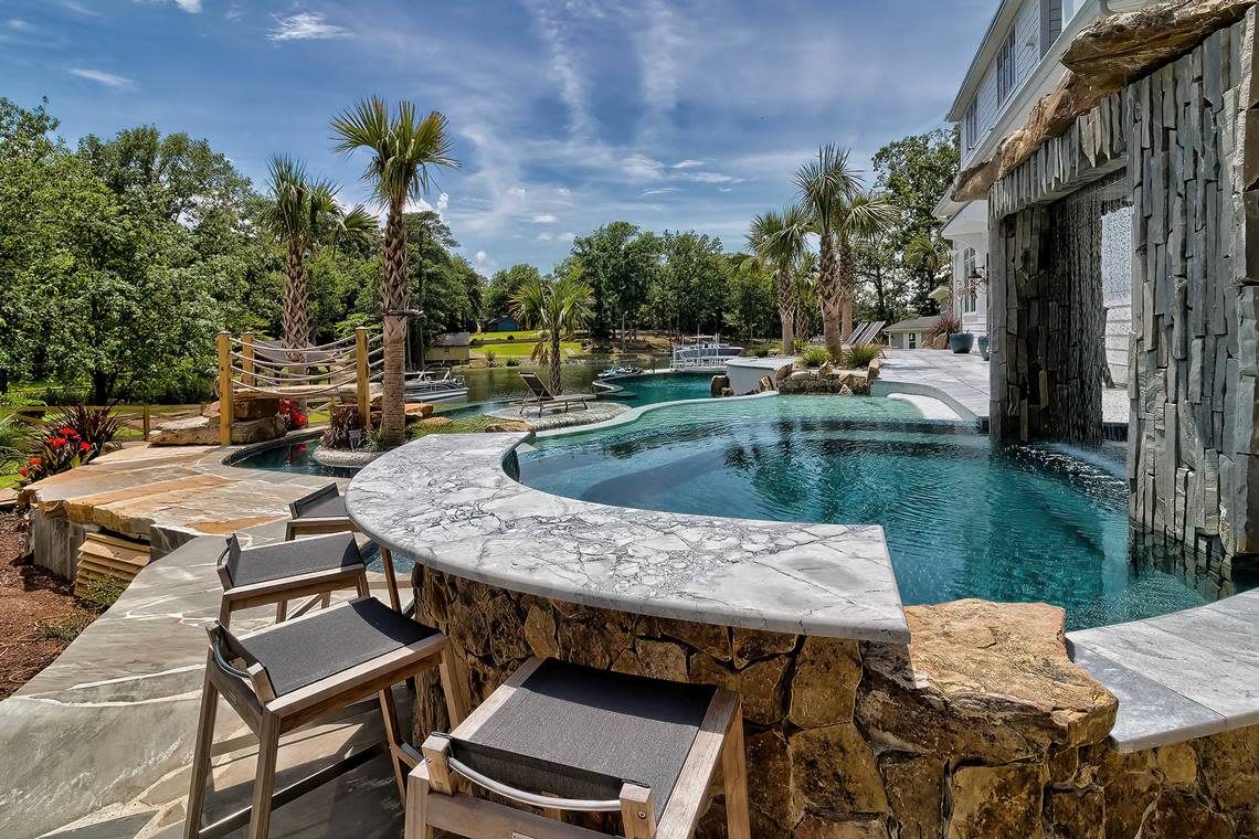 An image of a swim-up bar at a $3.4 million luxury home for sale on Lake Murray.