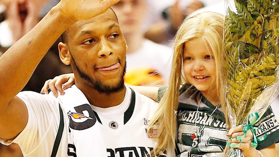 Adreian Payne and Lacey Holsworth, pictured here in 2014.