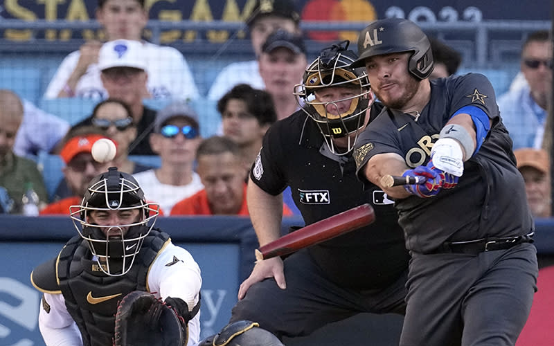A player breaks his bat during the third inning of the MLB All-Star baseball game