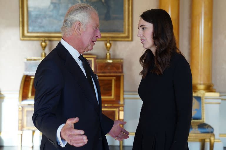 King Charles III meets with New Zealand Prime Minister Jacinda Ardern, during a meeting of Prime Ministers of the Realms, in the 1844 Room in Buckingham Palace in London on September 17, 2022. - Queen Elizabeth's state funeral will take place on September 19, in London's Westminster Abbey, with more than 2,000 guests invited, including heads of state and government from around the world. (Photo by Stefan Rousseau / POOL / AFP)