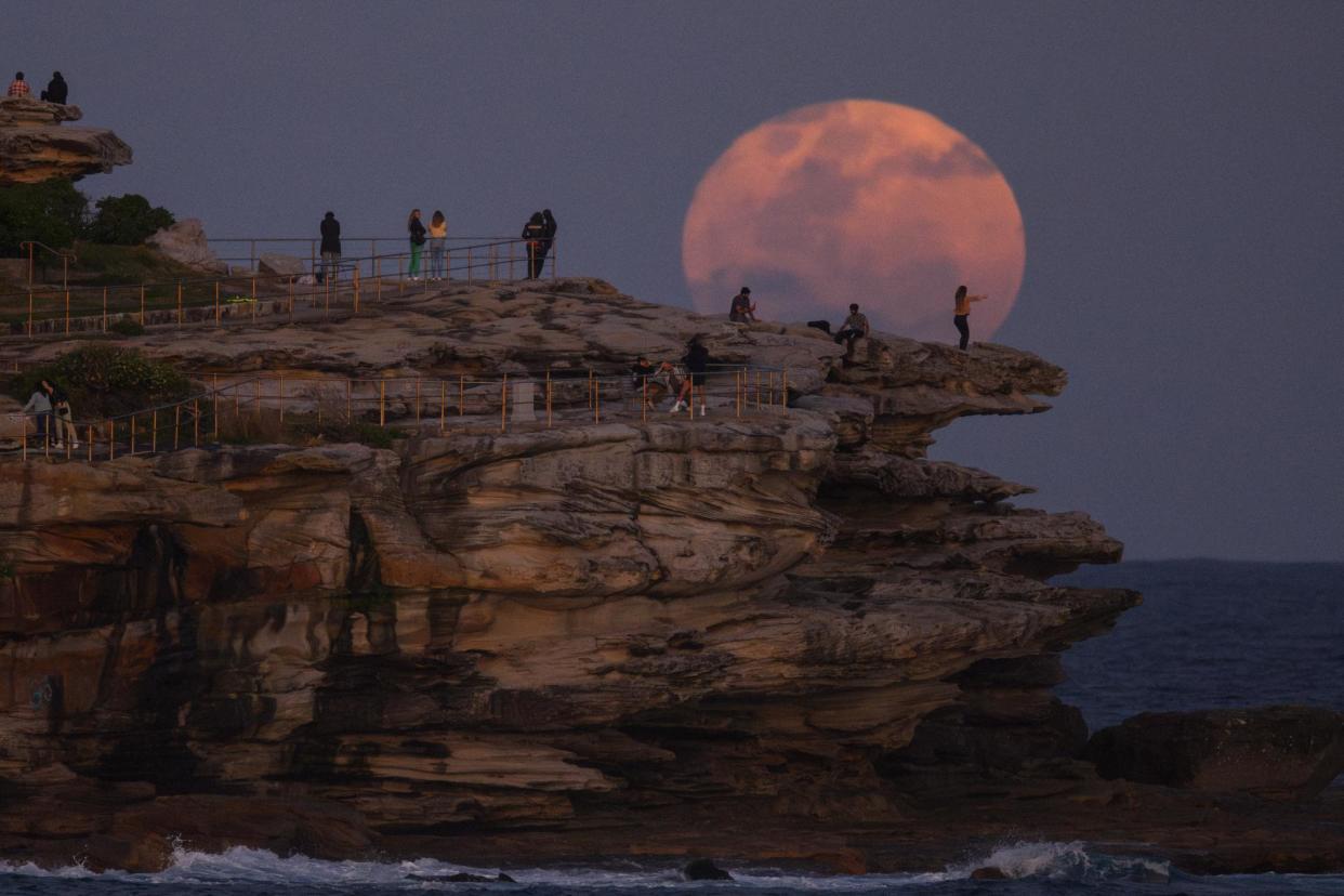 <span>A rare super blue moon appears in the night sky over Ben Buckler cliffs at Bondi Beach, Sydney in August last year. This August’s blue moon won’t be seen again for two or three years.</span><span>Photograph: AAP</span>