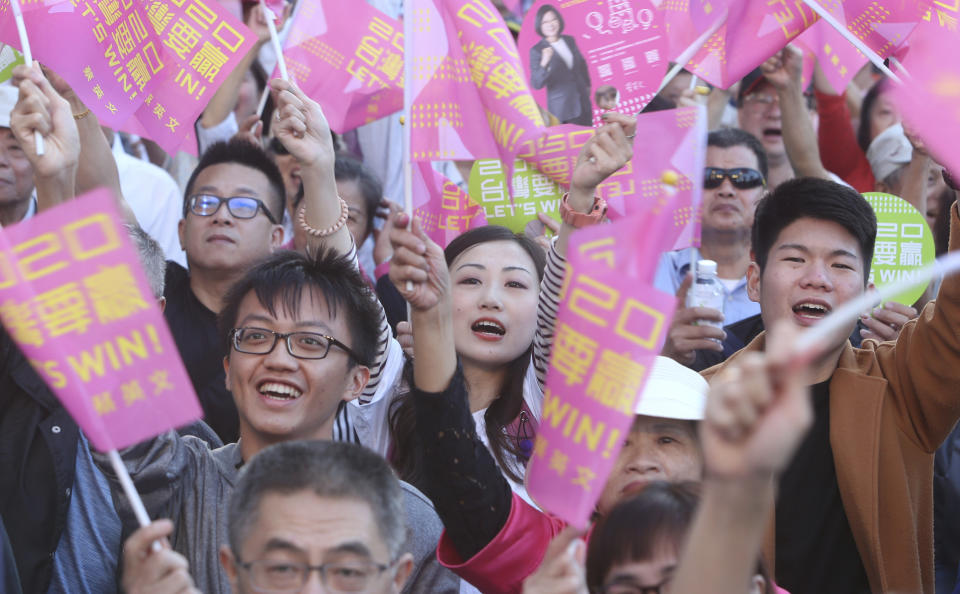Supporters of Taiwan President and Democratic Progressive Party presidential candidate Tsai Ing-wen cheer as Tsai launches her re-election campaign in Taipei, Taiwan, Sunday, Nov. 17, 2019. Taiwan will hold its presidential election on Jan. 11, 2020. (AP Photo/Chiang Ying-ying)