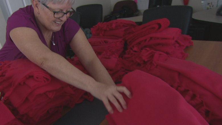 Last-minute donations keep AIDS Moncton in red (scarves)