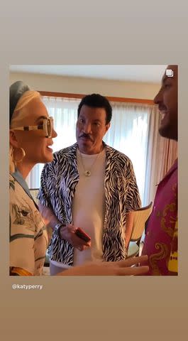 <p>Katy Perry/Instagram</p> Katy Perry telling Lionel Richie and Luke Bryan that she was pregnant