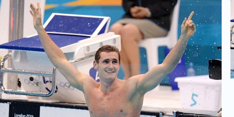 Cameron van der Burgh raises his arms in victory at the 2012 Olympics. (Photo: Tony Marshall - PA Images via Getty Images)