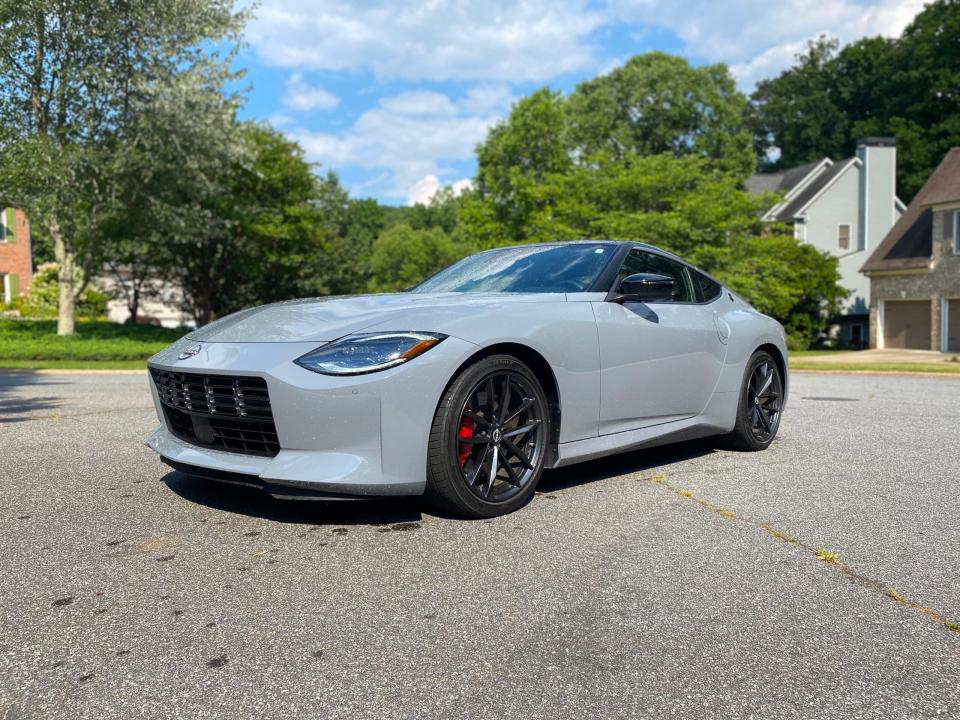 The driver's side front end of a gray 2024 Nissan Z Performance sports car.