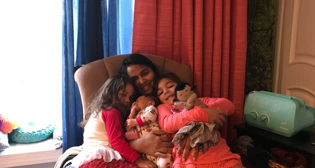 The author and her three children at home. 