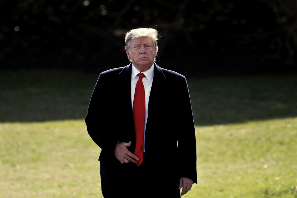 President Donald Trump leaves the Oval Office of the White House, Thursday March 28, 2019, in Washington, en route to Michigan. Trump will speak at a rally in Michigan before spending the weekend at his Mar-a-Lago estate in Florida. (AP Photo/Jacquelyn Martin)