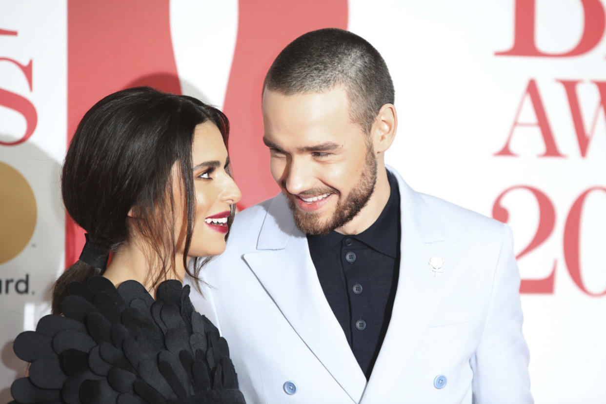 Singers Cheryl, left, and Liam Payne pose for photographers upon arrival at the Brit Awards 2018 in London, Wednesday, Feb. 21, 2018. (Photo by Vianney Le Caer/Invision/AP)