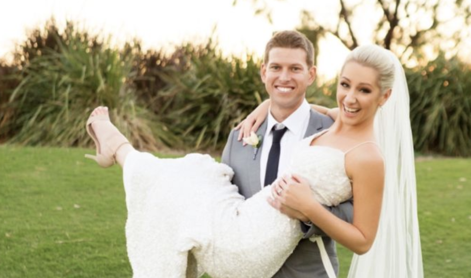 Ashleigh Conwell is pictured with husband Matt on their wedding day.