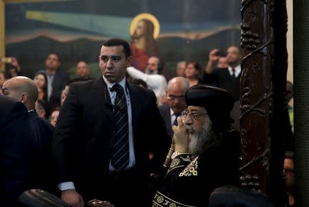 Egyptian Coptic Pope Tawadros II (R), head of the Coptic Orthodox church, attends to the funeral of Anba Abraham, Coptic Orthodox Metropolitan Archbishop of Jerusalem and the Near East, in Jerusalem's Old City November 28, 2015. REUTERS/Ronen Zvulun