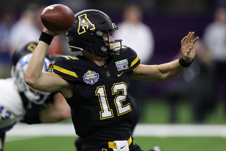 NEW ORLEANS, LOUISIANA - DECEMBER 15: Zac Thomas #12 of the Appalachian State Mountaineers looks to throw a pass against the Middle Tennessee Blue Raiders during the R&L Carriers New Orleans Bowl at the Mercedes-Benz Superdome on December 15, 2018 in New Orleans, Louisiana. (Photo by Chris Graythen/Getty Images)