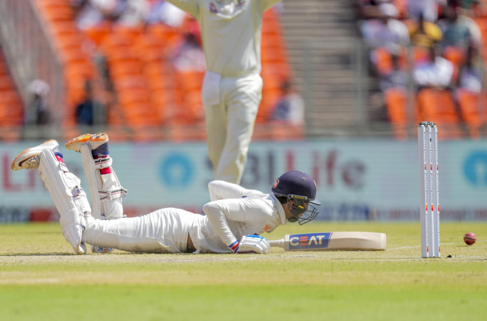 India's Shubman Gill dives to make it successfully into the crease during the third day of the fourth cricket test match between India and Australia in Ahmedabad, India, Saturday, March 11, 2023. (AP Photo/Ajit Solanki)