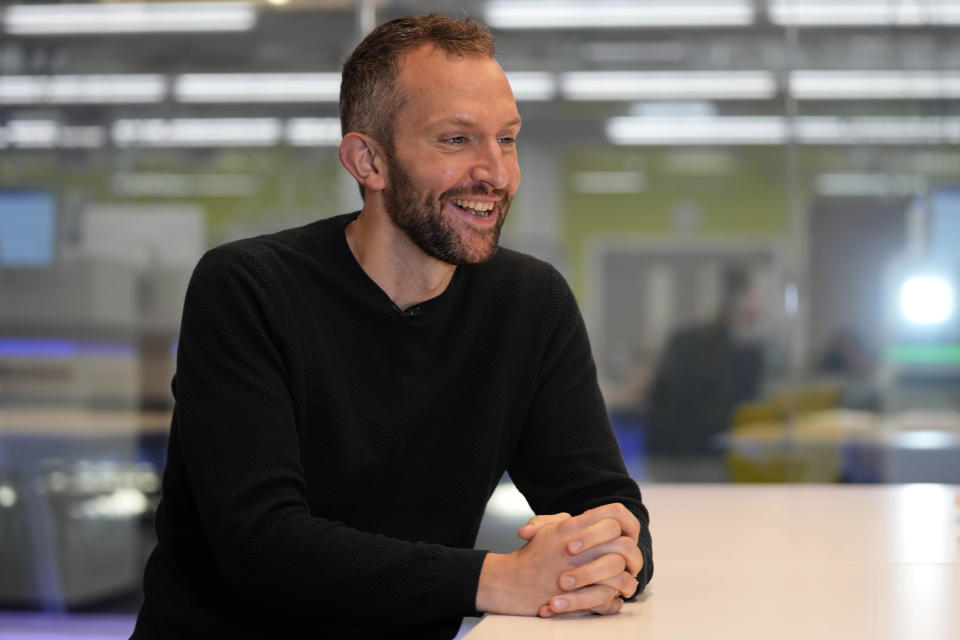 Ewan Harrison, a senior research fellow at the Wellcome Sanger Institute, speaks to The Associated Press on the Genome Campus, Hinxton, Cambridgeshire, England, Friday, on Jan. 7, 2022. British scientists hunting down coronavirus variants have a new mission: sharing their expertise with others around the world. The omicron variant now fueling a new wave of infection around the world shows the need for global cooperation, Harrison said. (AP Photo/Frank Augstein)