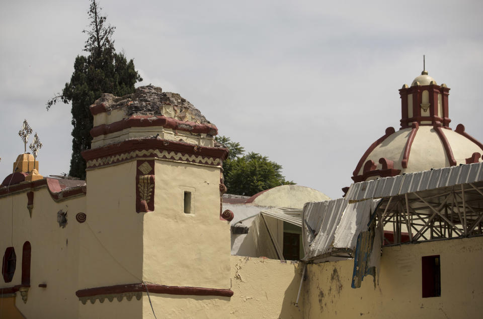 A Catholic church’s bell tower is missing after the 7.1-magnitude earthquake in San Gregorio Atlapulco, Mexico, Friday, Sept. 22, 2017. Mexican officials are promising to keep up the search for survivors as rescue operations stretch into a fourth day following Tuesday’s major earthquake that devastated Mexico City and nearby states. (AP Photo/Eduardo Verdugo)