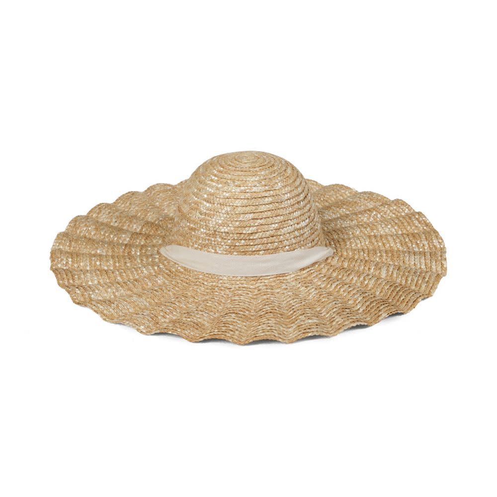 <p><a href="https://go.redirectingat.com?id=74968X1596630&url=https%3A%2F%2Flackofcolor.com%2Fcollections%2Fstraw%2Fproducts%2Fscalloped-dolce-hat&sref=https%3A%2F%2Fwww.harpersbazaar.com%2Ffashion%2Ftrends%2Fg43819732%2Fbest-trendy-hats%2F" rel="nofollow noopener" target="_blank" data-ylk="slk:Shop Now;elm:context_link;itc:0;sec:content-canvas" class="link rapid-noclick-resp">Shop Now</a></p><p>Scalloped Dolce Hat</p><p>$139.00</p><p>lackofcolor.com</p>