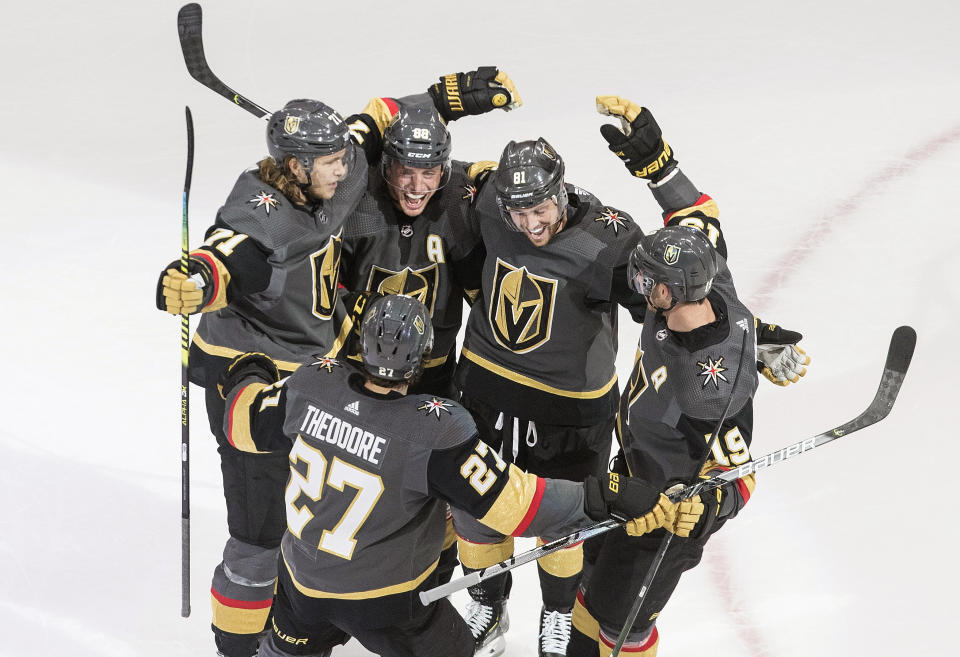 Vegas Golden Knights celebrate a goal during the third period of an NHL hockey playoff game against the Dallas Stars Monday, Aug. 3, 2020 in Edmonton, Alberta. (Jason Franson/The Canadian Press via AP)