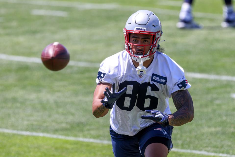 Patriots tight end Devin Asiasi makes a catch during a drill during minicamp in June. He has been impressive during training camp.
