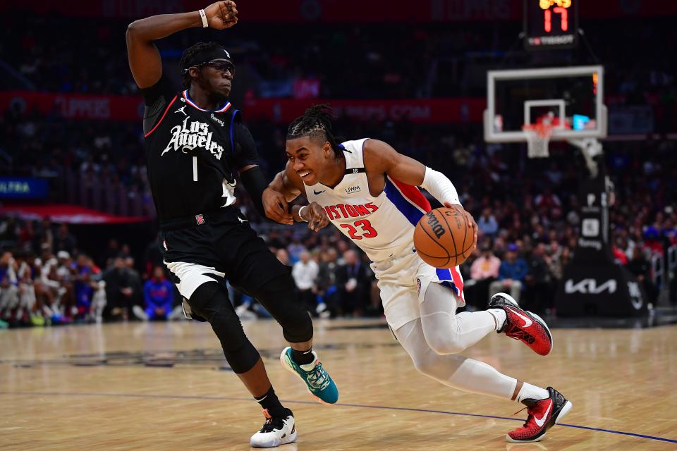 Detroit Pistons guard Jaden Ivey (23) moves to the basket against Los Angeles Clippers guard Reggie Jackson (1) during the second half at Crypto.com Arena in Los Angeles on Thursday, Nov. 17, 2022.